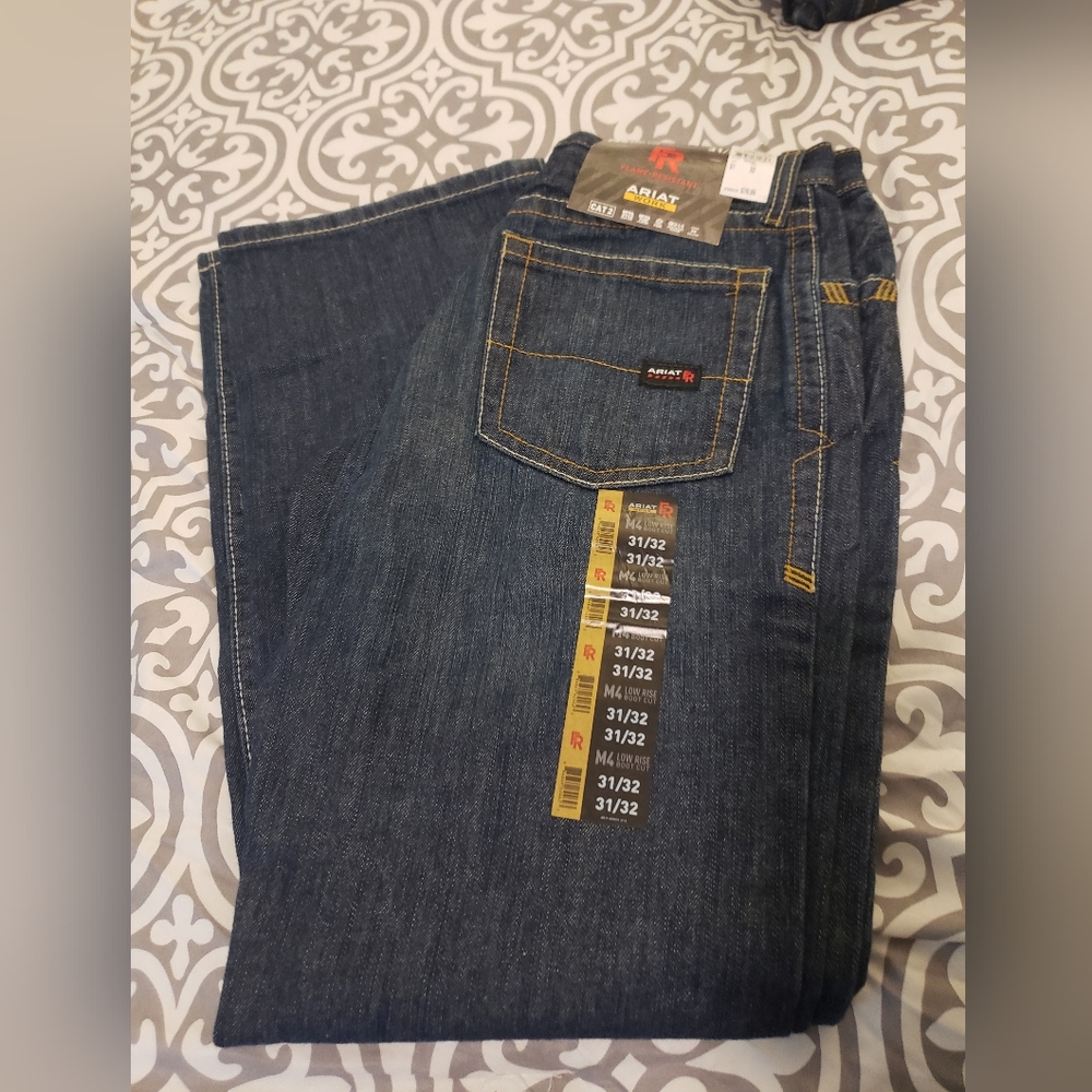 COPY - COPY - Ariat FR M4 low rise boot cut jeans 31x32